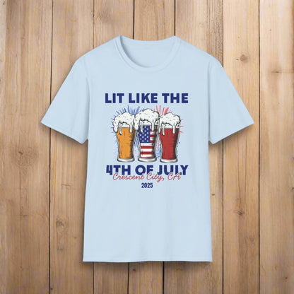 Light Blue t-shirt featuring three pint glasses—one filled with the American flag with slogan Lit Like the 4th of July Crescent City, CA 2025.