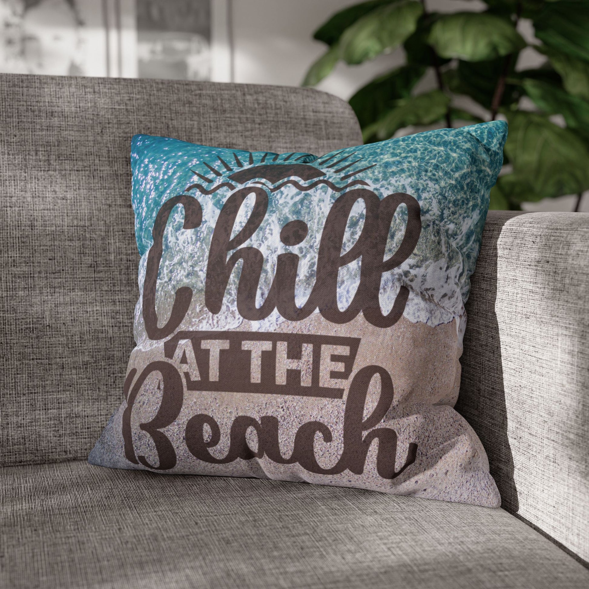 18" x 18" Decorative pillow with 'Chill at the Beach' text on a beach background. 
