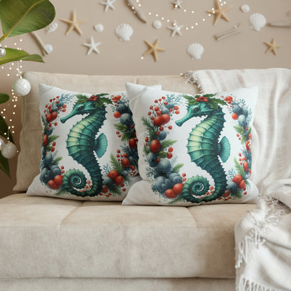 Decorative pillows with seahorse designs on a couch