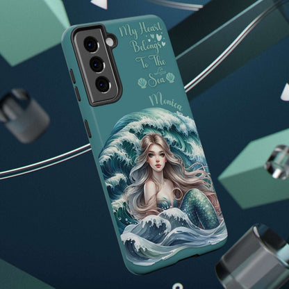 iPhone case with mermaid design and text on a dark blue background