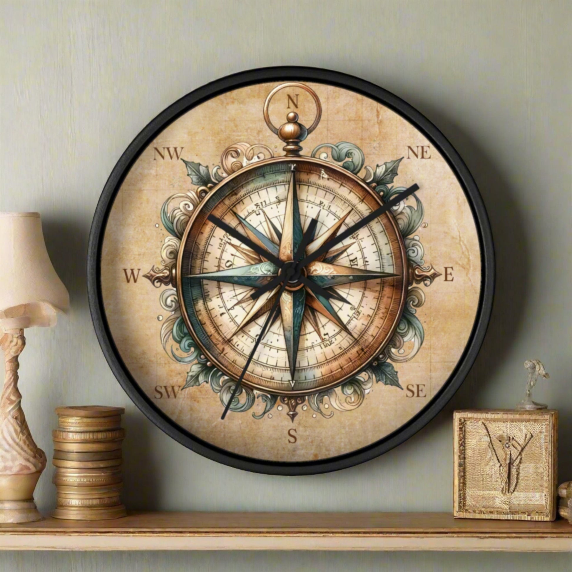 Round 10" wall clock with black frame with picture of compass.