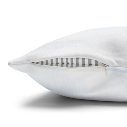 White pillow with a striped interior on a white background