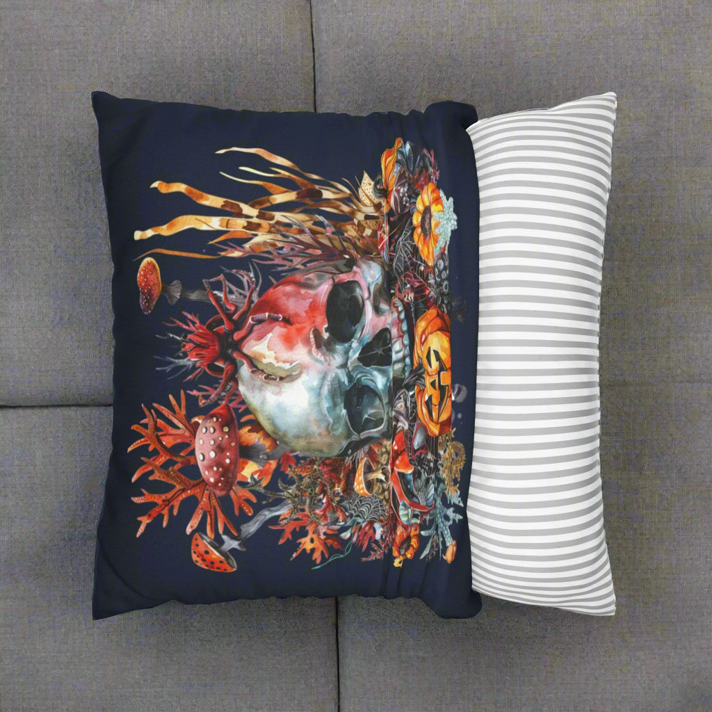 Decorative pillow with a colorful skull and coral design showing the ease of removal.