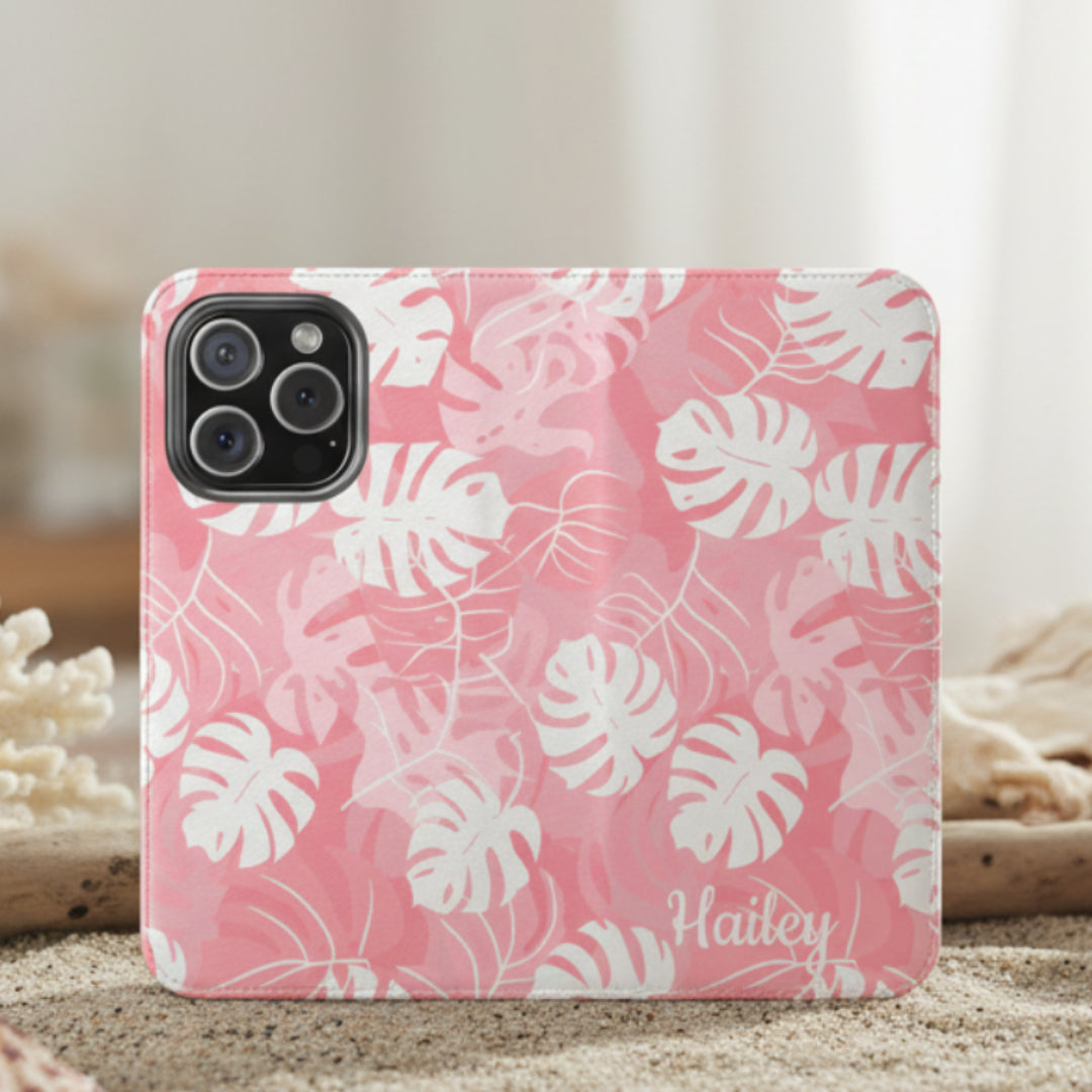 Phone case with pink and white leaf pattern and 'Hailey' branding