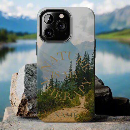 Phone case with nature design and 'Nature is my therapy' text on a gray background