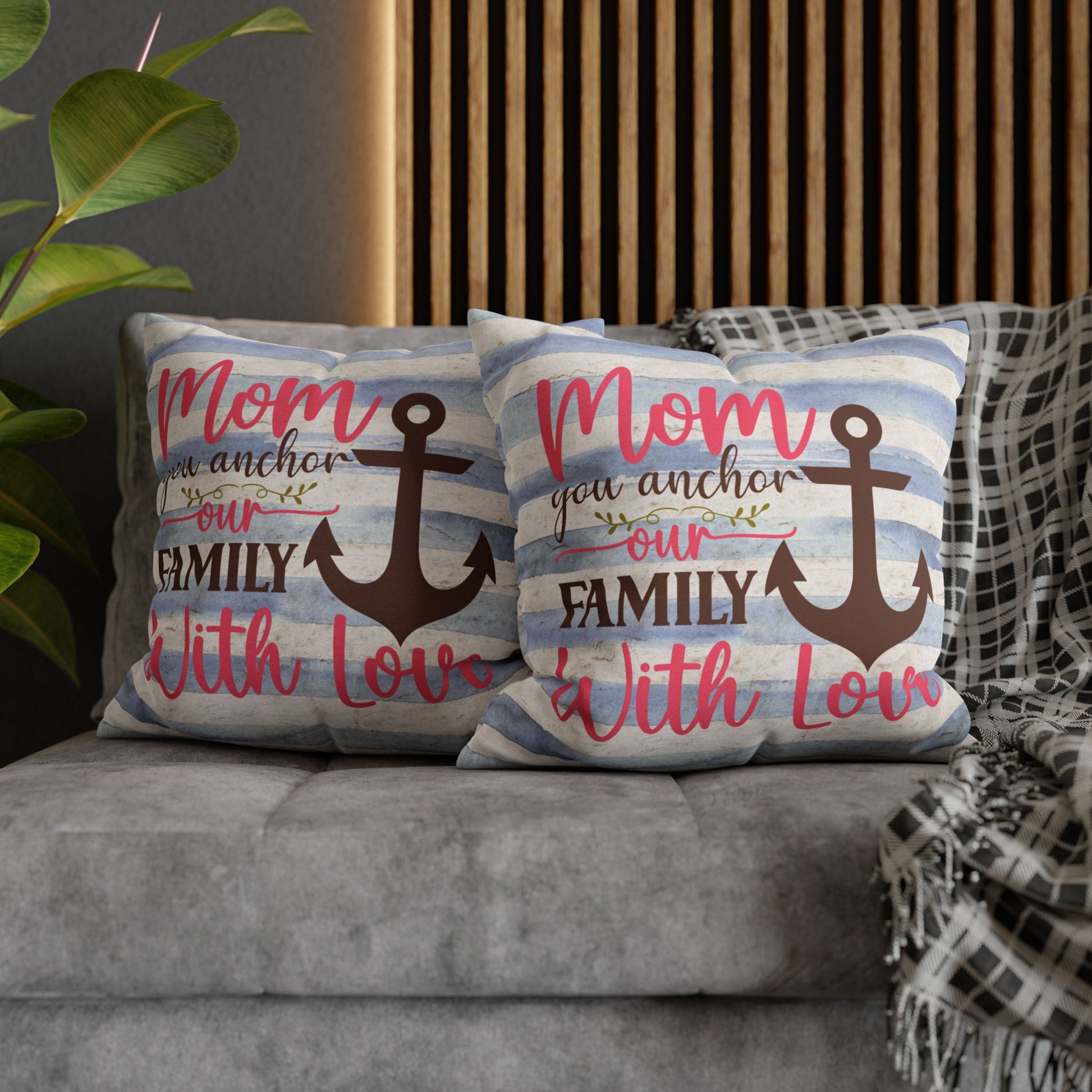 Two 20" x 20" Decorative pillow blue and white striped pillowcase with an anchor design and the words “Mom is the Anchor of Our Family.”