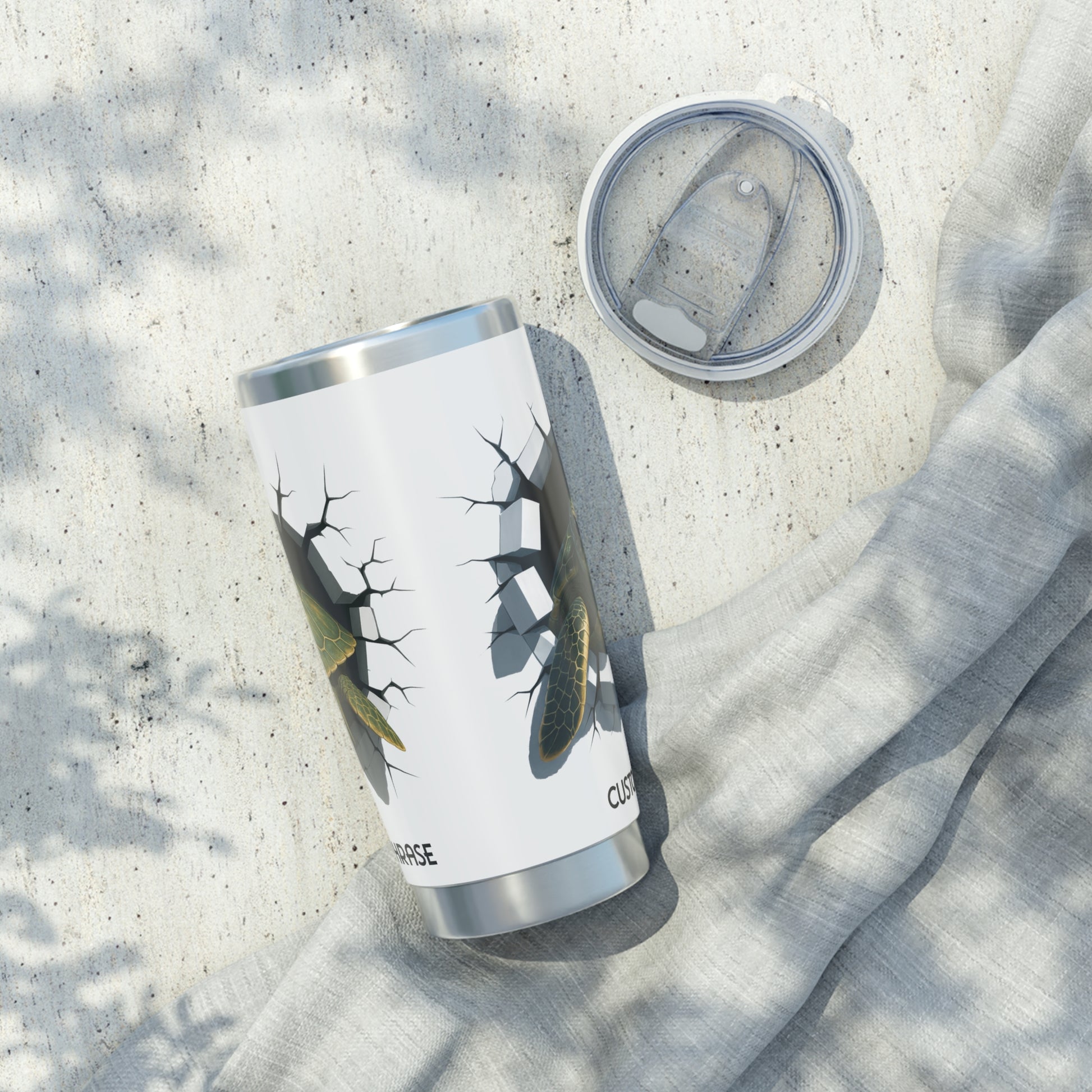 Side view of white tumbler with a breakout design of a sea turtle personalized.