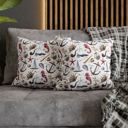 Two 16" x 16" white pillowcases featuring detailed graphics of anchors, seashells, sailboats, and seahorses in a nautical-themed pattern.