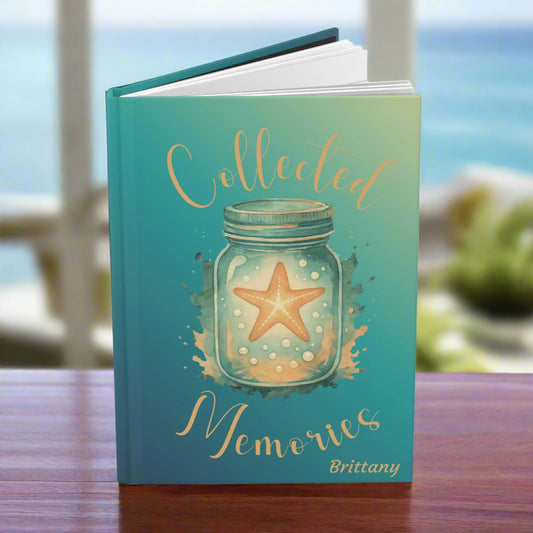 Notebook with a starfish design and 'Collected Memories' on the front and 'Never Forgotten' on the back.