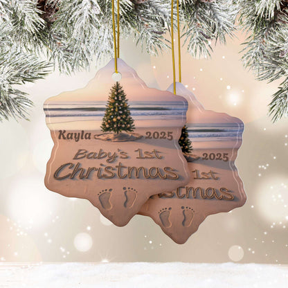 Star-shaped Christmas ornament with 'Baby's 1st Christmas 2025' text, tree, and footprints, hanging against a snowy background.