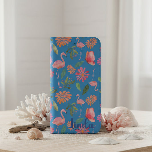 Flip phone case with flamingo and floral design on a blue background and personalized with name.
