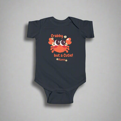 Black short-sleeved bodysuit with cartoon crab that says crabby but a cutie with a space for a personalized name below.