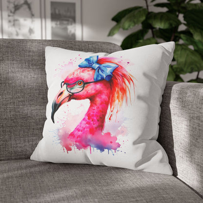 Decorative square pillowcase featuring a flamingo head wearing glasses and a big blue bow on a white background.