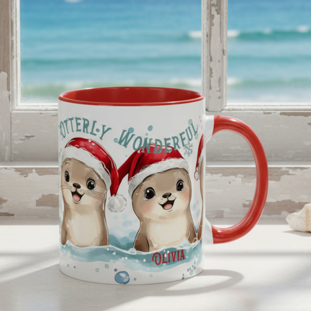 Mug with otters wearing Santa hats and the text 'Otterly Wonderful Olivia' on a white background.