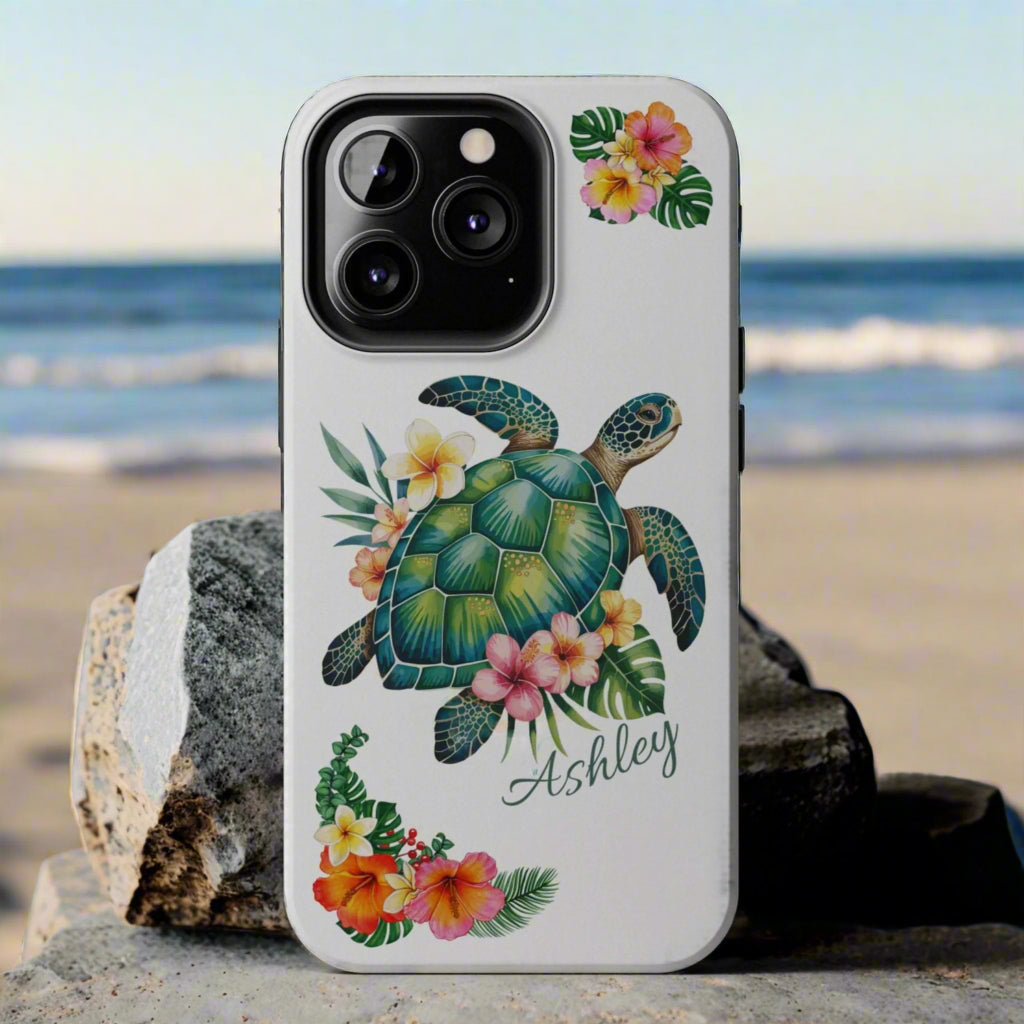 iPhone 11 case with a white background and a sea turtle with hibiscus flowers, with more hibiscus flowers around the sides.