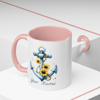 11 oz White mug with pink handle and interior with Anchor and Sunflowers with text Seas the Day