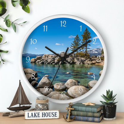Wall clock with a scenic design of a lake and trees on a white background