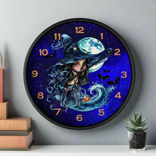 Decorative Wall clock featuring a witch with waves, pumpkins, bats, and a moon in the night sky.