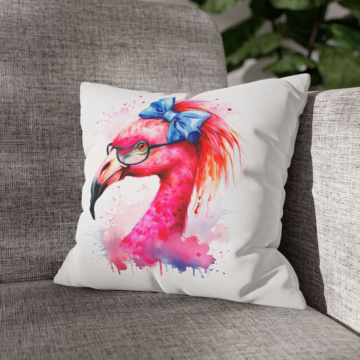 Decorative Square pillowcase featuring a flamingo head wearing glasses and a big blue bow on a white background.