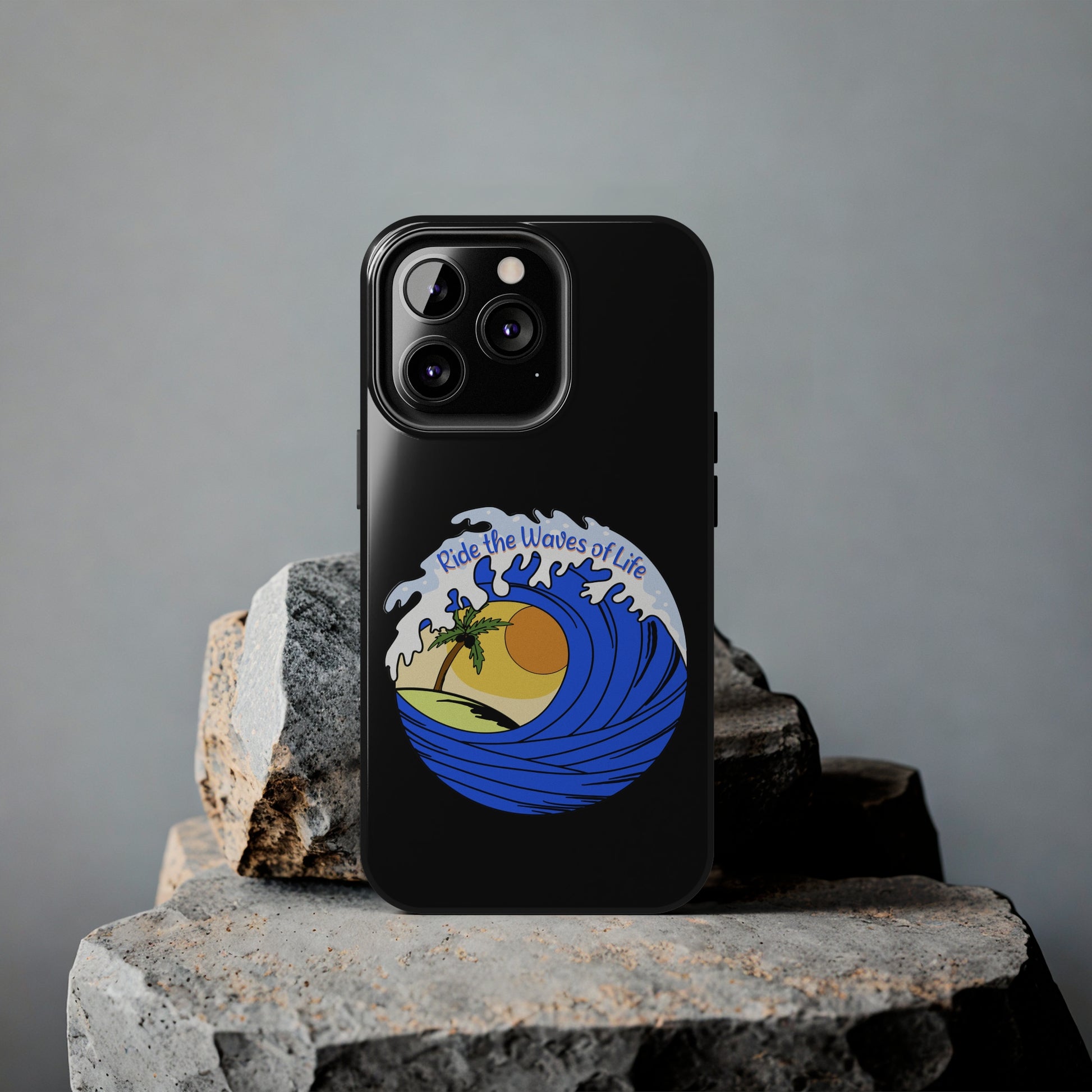 black Iphone Tough Case with a blue wave and sunset that says Ride the Waves of Life