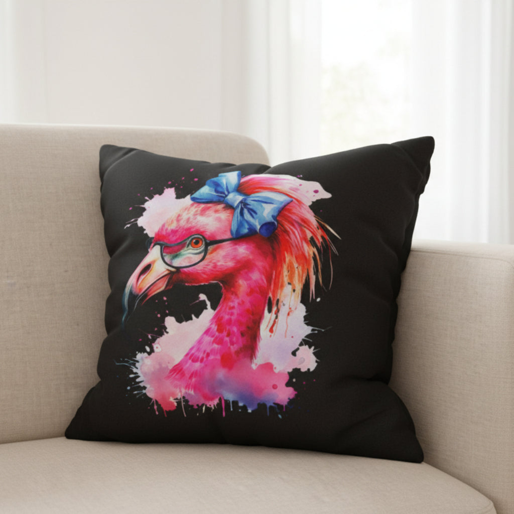 Decorative pillow with a colorful flamingo design on a beige couch.