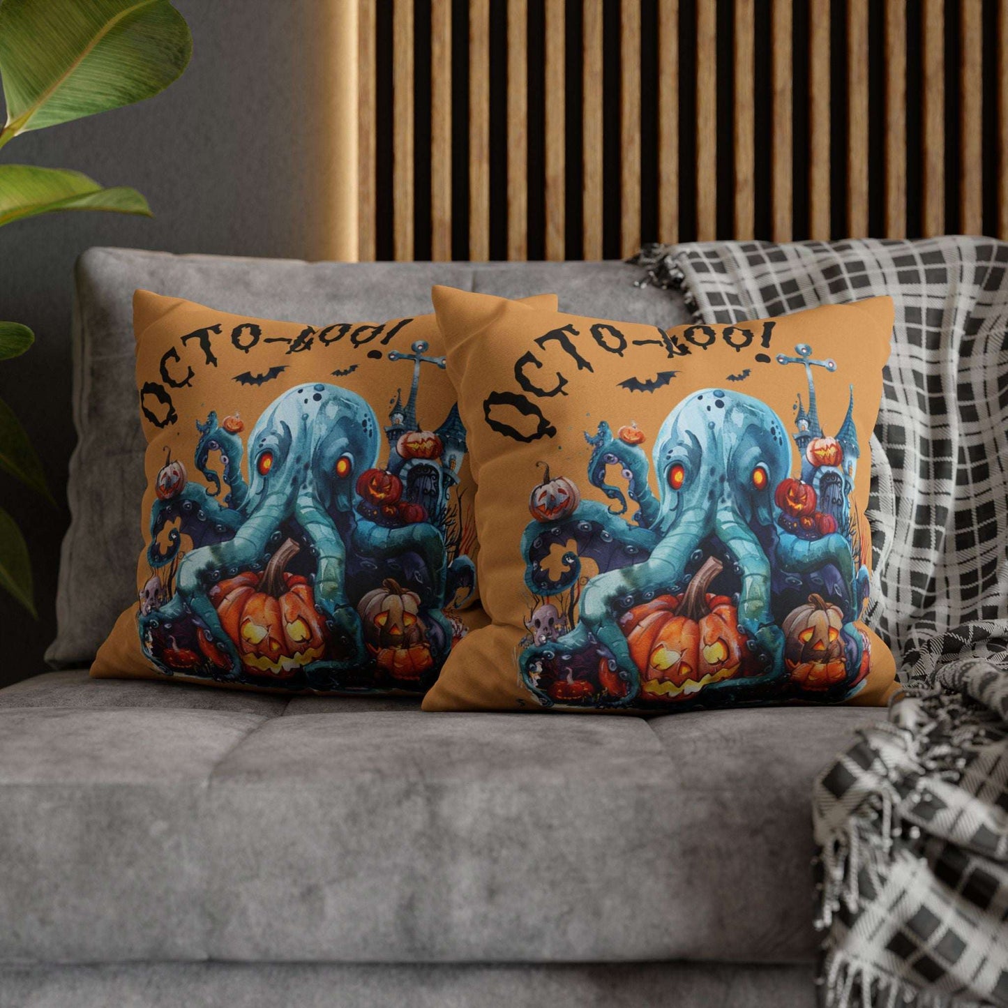 Halloween-themed double-sided decorative pillowcases with octopus and pumpkins that says Octo-Boo!