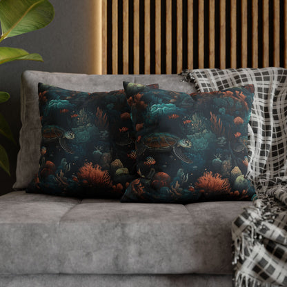 18" x 18"  two decorative pillows with underwater scene with sea turtles on a gray couch.