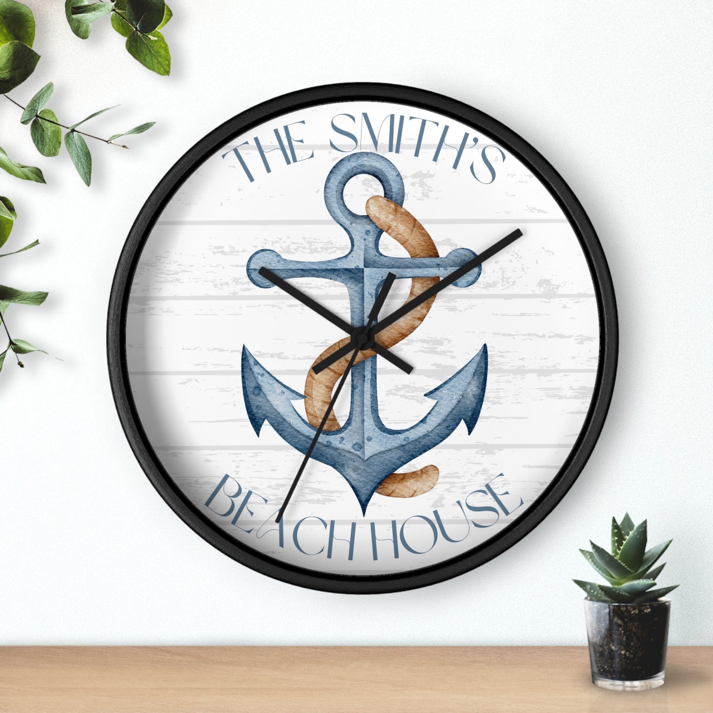 10" round wall clock black frame black hands blue anchor with the text Personalized Name Beach House.