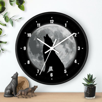 Wall clock with a wolf howling at the moon design on a white background