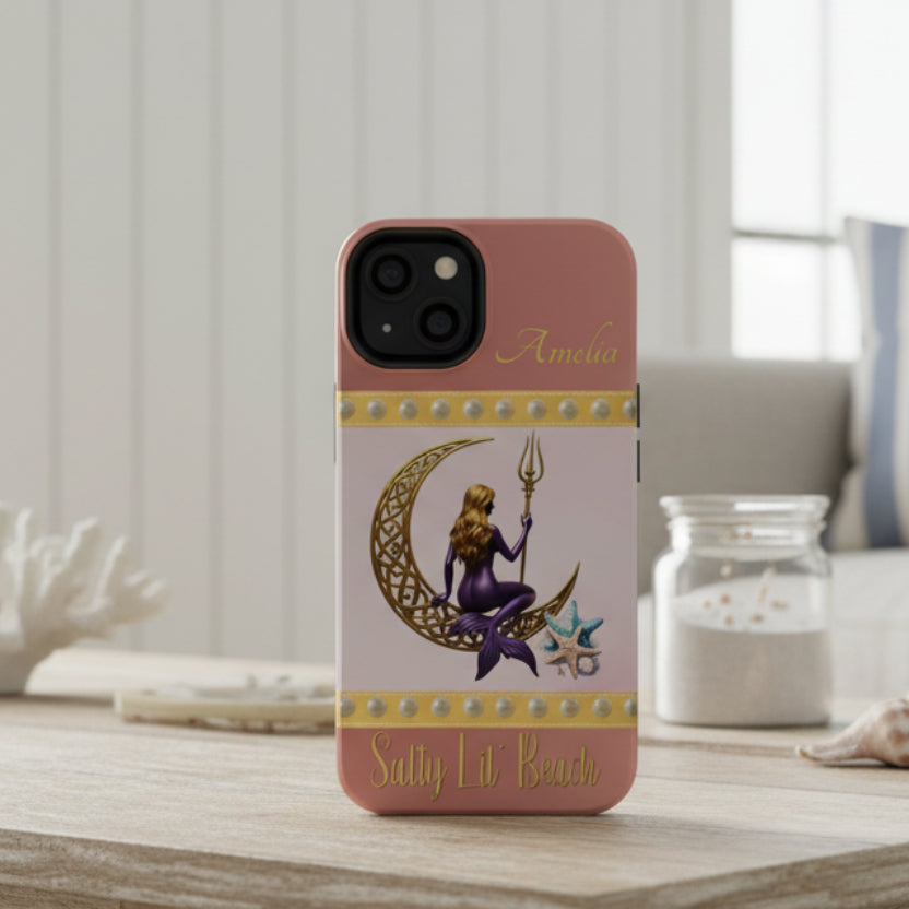 Phone case with mermaid design on a pink background