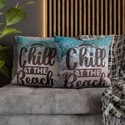 Two 20" x 20" decorative pillows with 'Chill at the Beach' text on a beach background. 