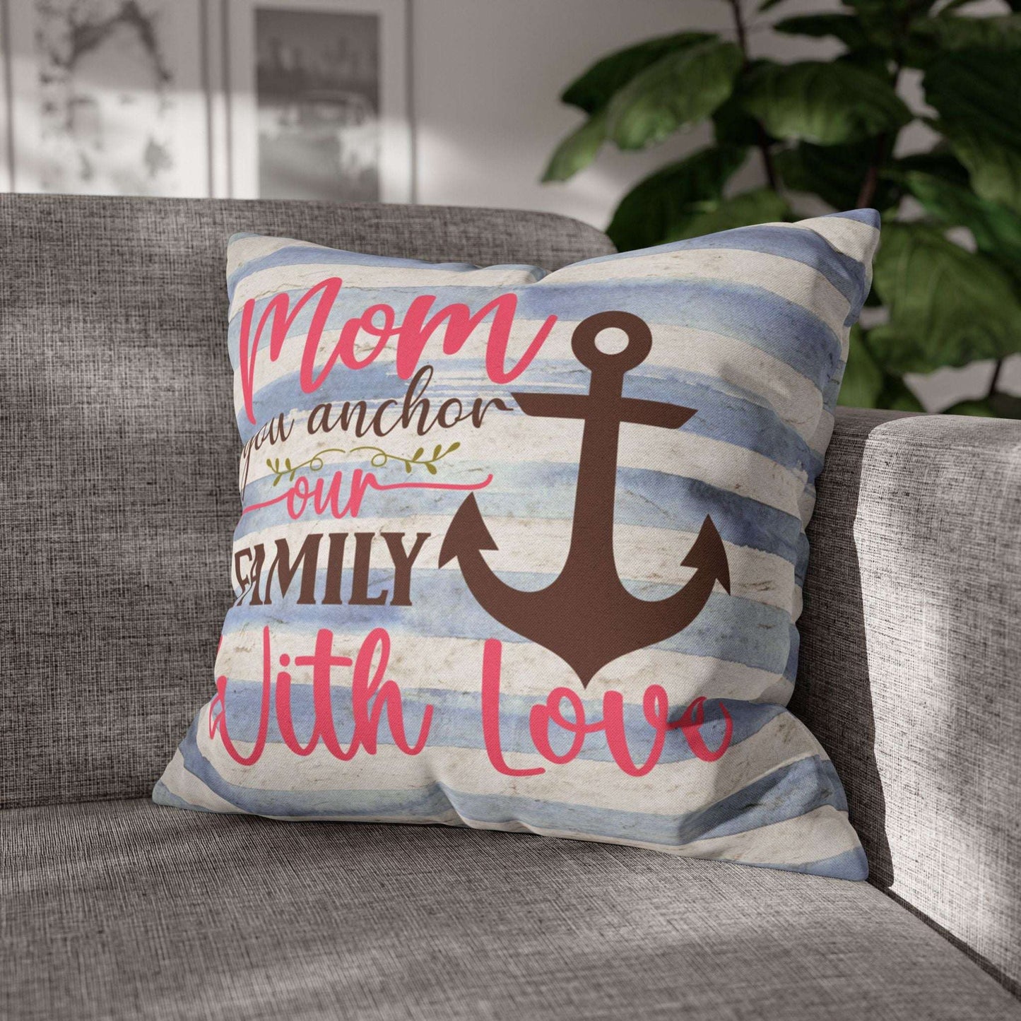 20" x 20" Decorative pillow blue and white striped pillowcase with an anchor design and the words “Mom is the Anchor of Our Family.”