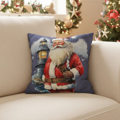 Decorative pillow with Santa Claus and lighthouse design on a couch.