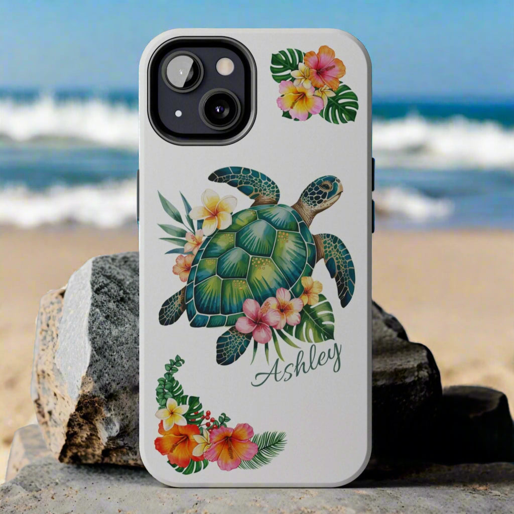 iPhone 11 case with a white background and a sea turtle with hibiscus flowers, with more hibiscus flowers around the sides.