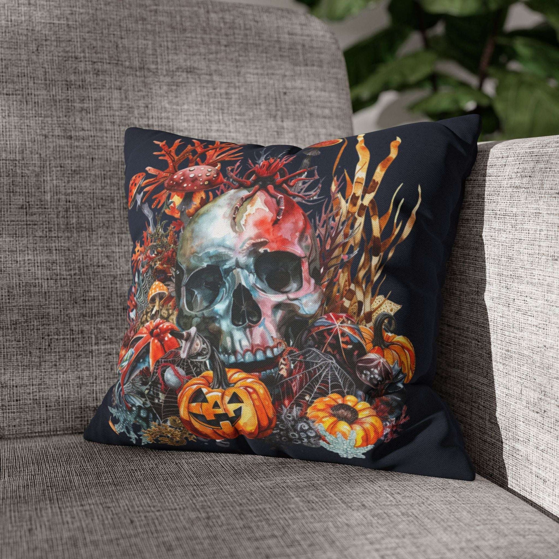 Decorative pillow cases with a skull and pumpkins design on a dark background.