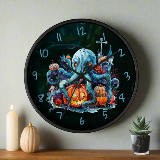 Decorative clock with Halloween-themed design featuring an octopus and pumpkins on a black background.