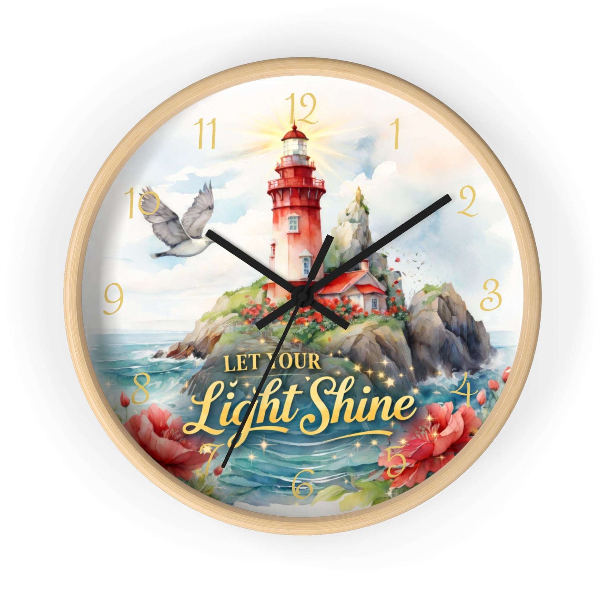 Decorative wall clock with a lighthouse design and 'Let Our Light Shine' text on a white background.