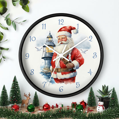 Wall clock with Santa Claus design featuring a lighthouse, surrounded by greenery and a small plant.