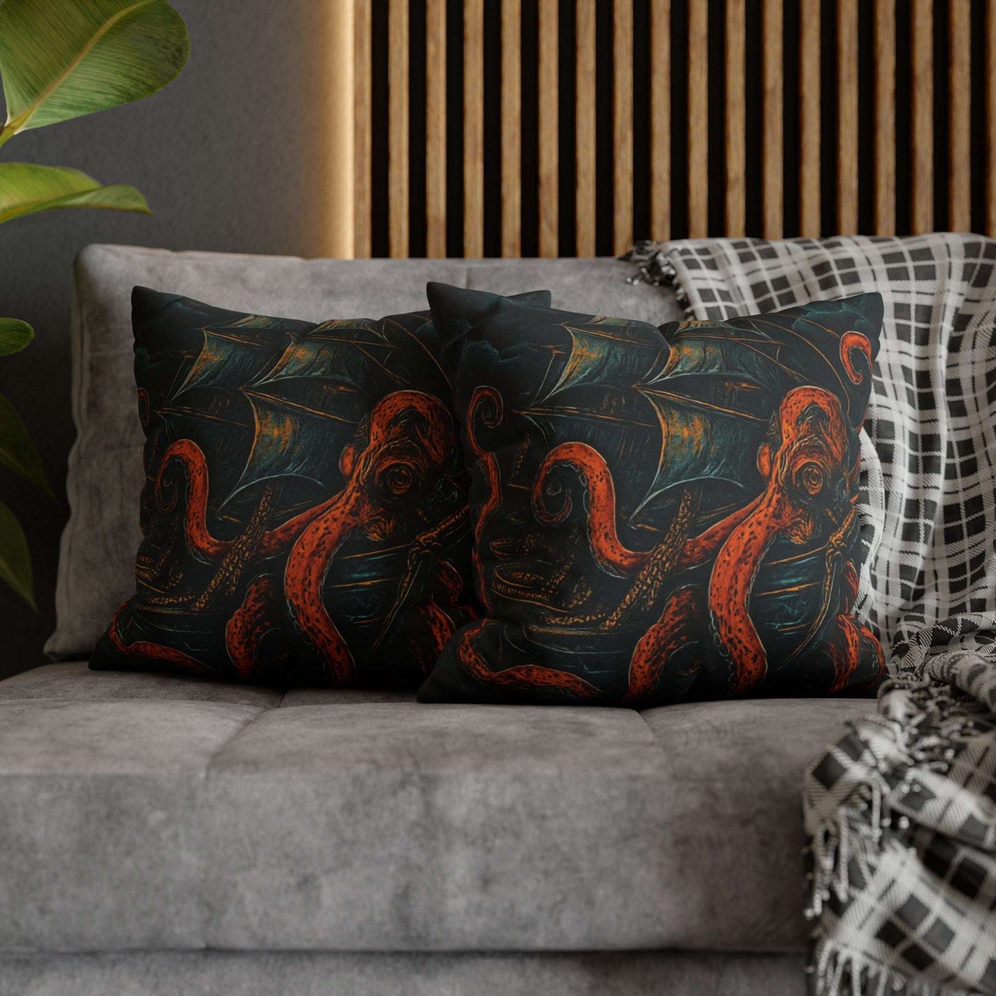 18" x 18" Black pillowcase with a design of a large octopus enveloping an old sail ship.
