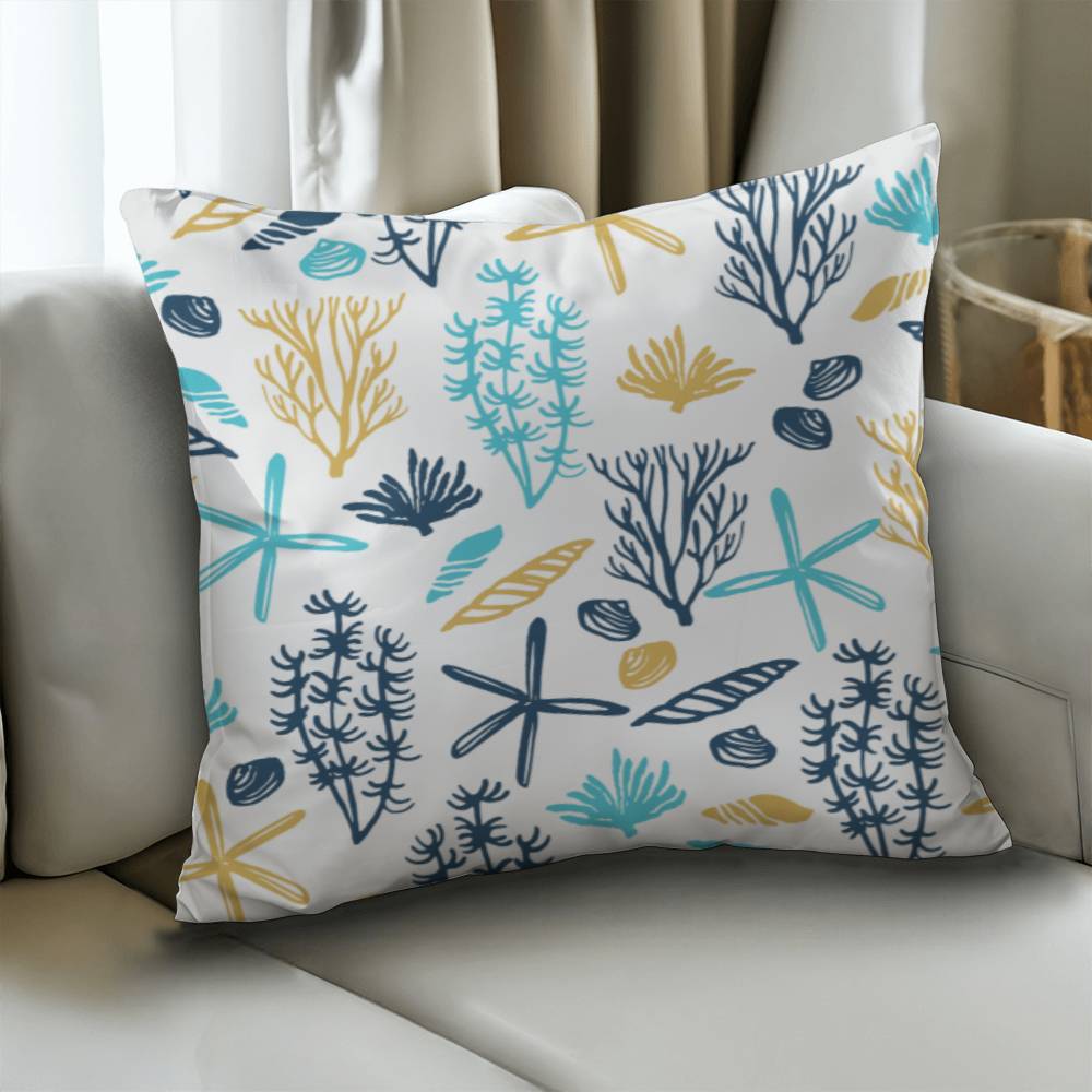 18" white pillow with blue and yellow underwater plant life