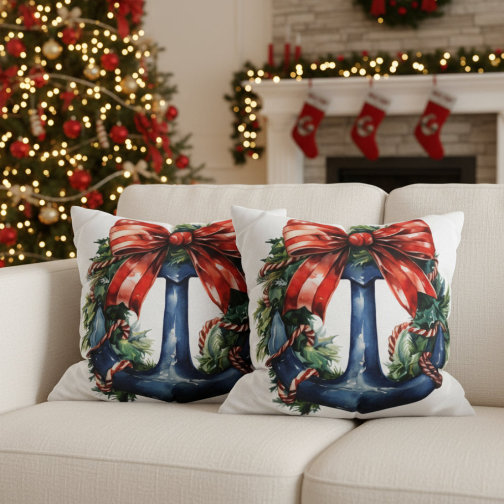 Decorative pillows with Christmas-themed designs on a sofa.