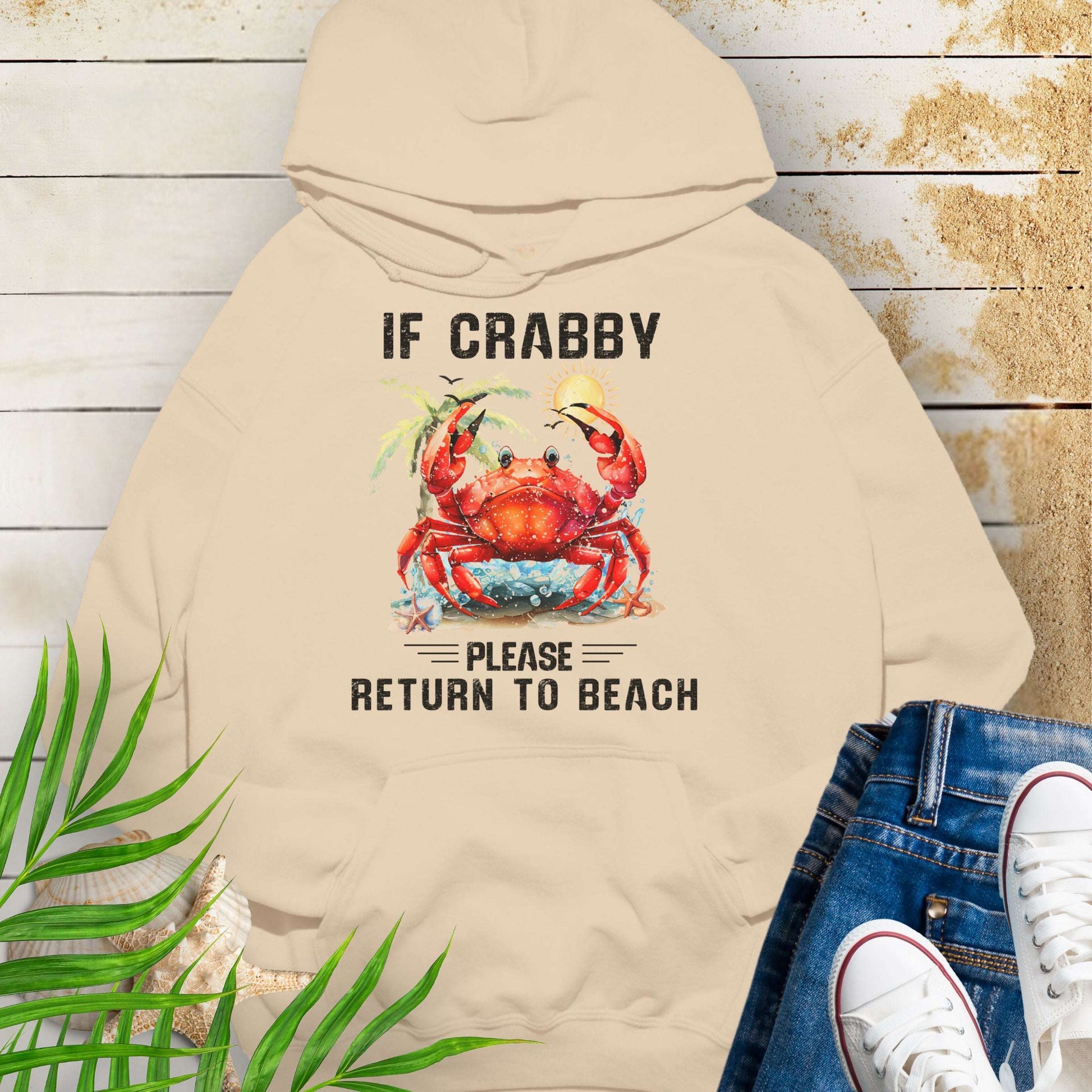 Beige hoodie with a crab graphic and text If Crabby Please Return to Beach.