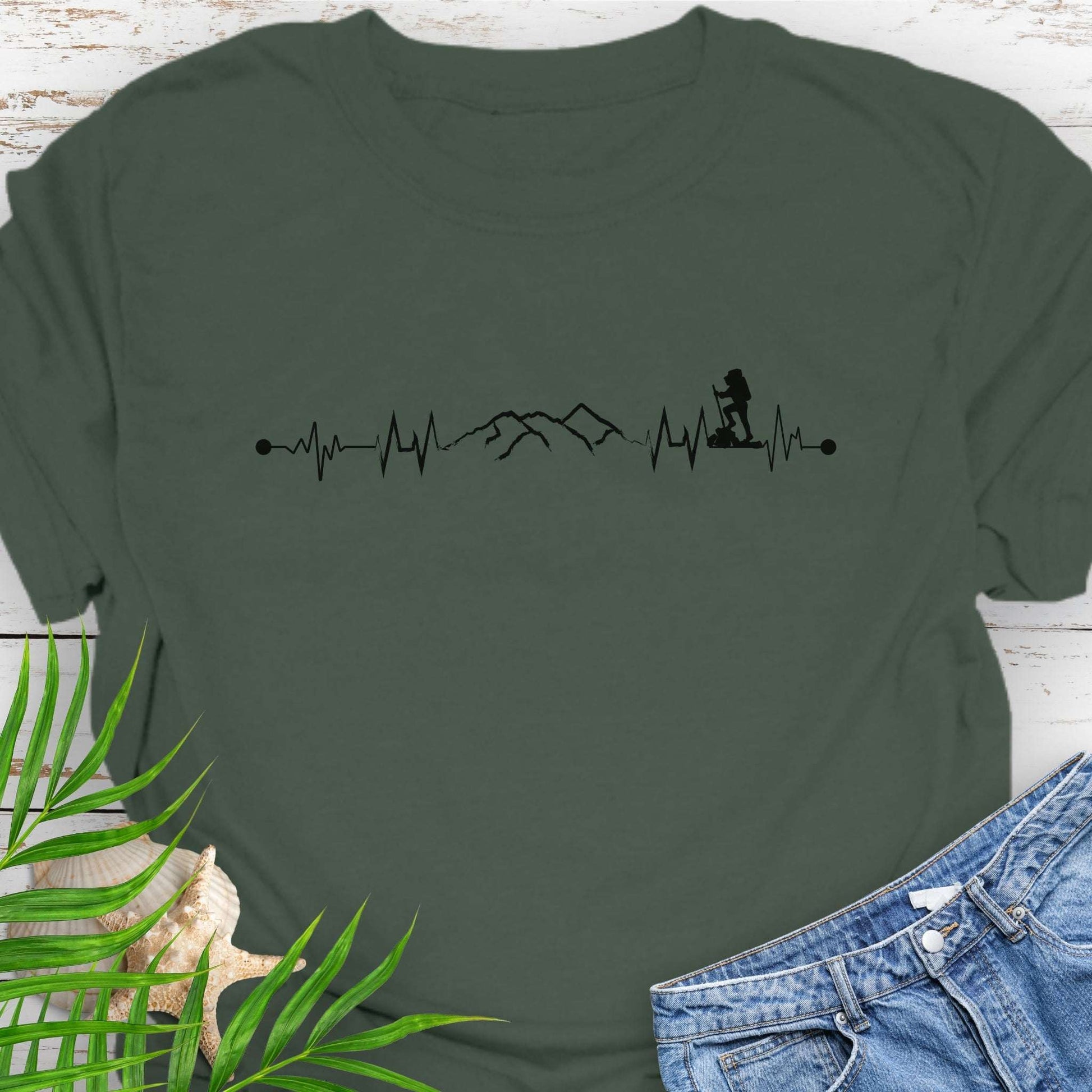 Green t-shirt with a heartbeat line with a mountain range and backpacker.