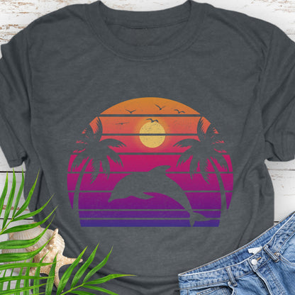 Gray T-shirt with a dolphin against a retro sunset and two palm trees.