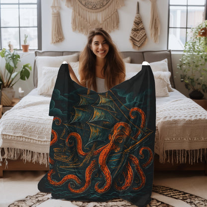 Woman holding a decorative blanket with an octopus design in a cozy bedroom.