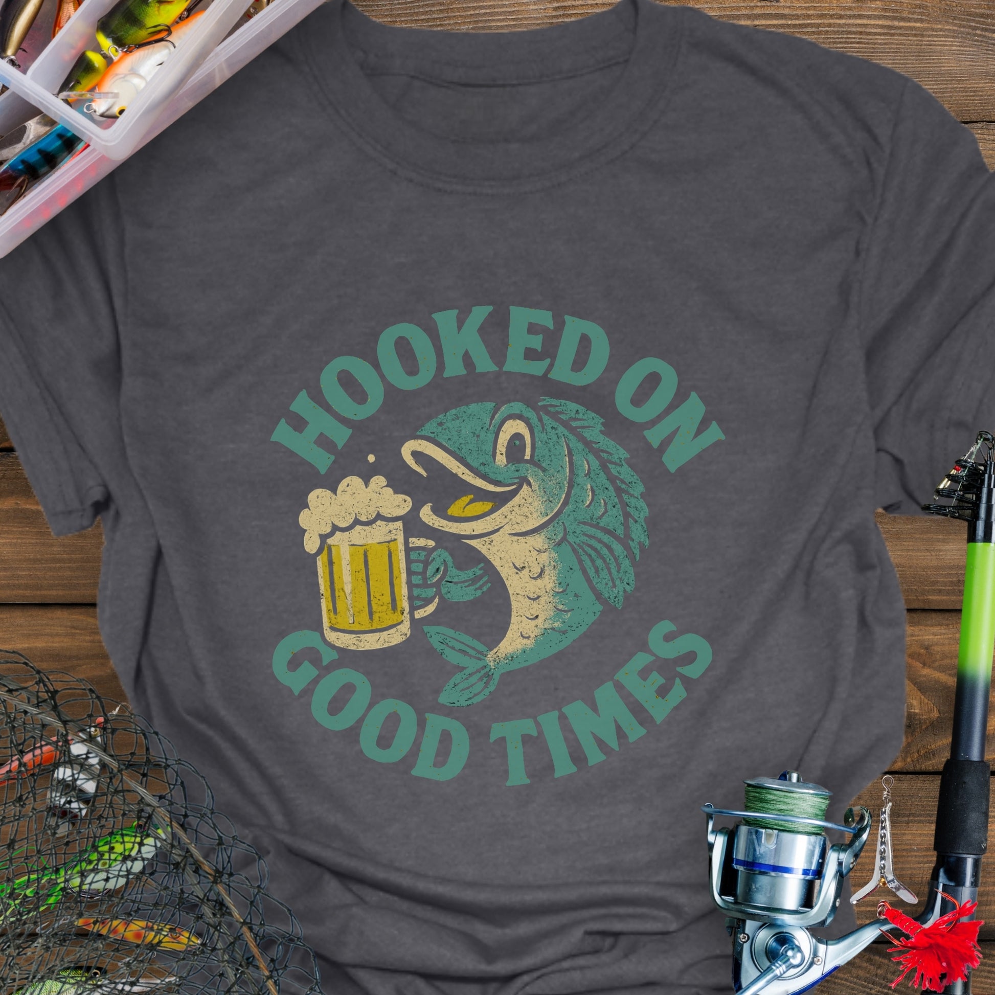 Gray T-shirt with a cartoon fish holding a beer mug and the words "Hooked On Good Times."