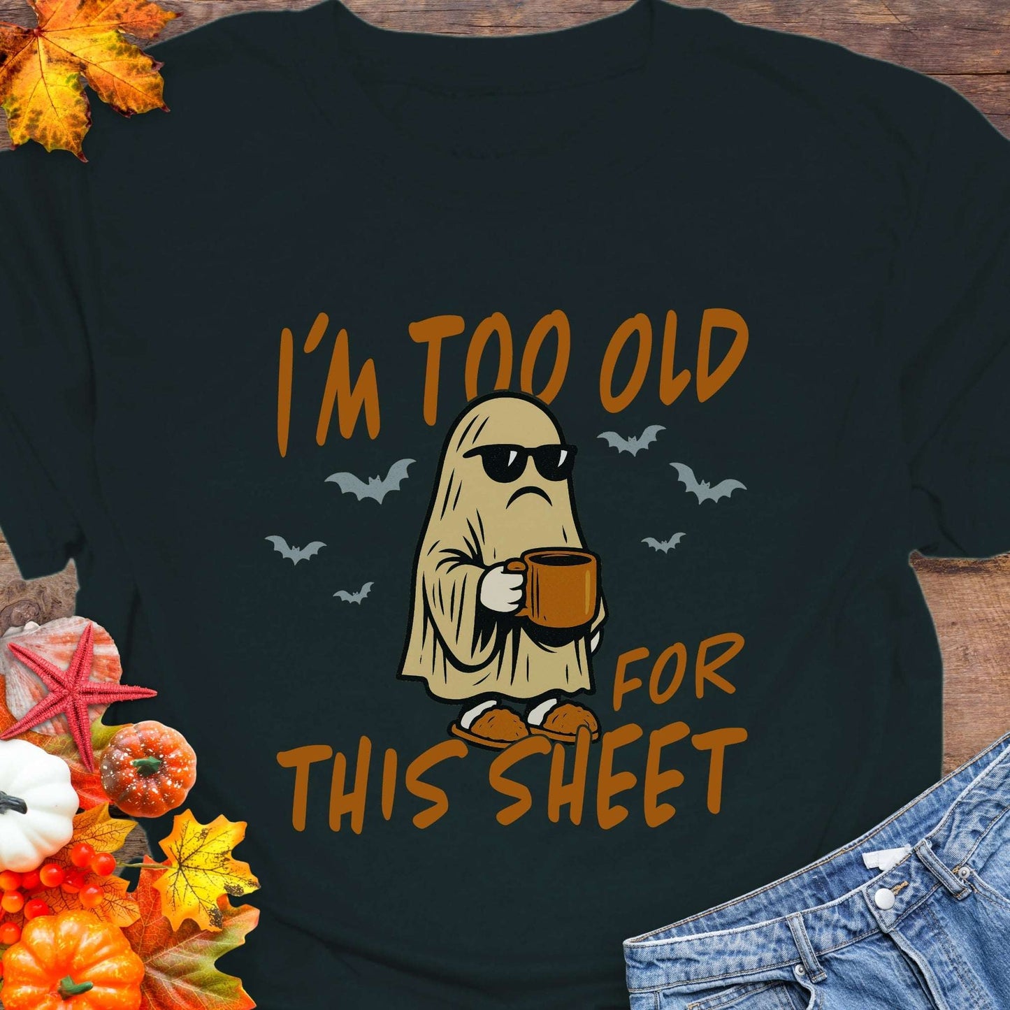 Black t-shirt with ghost graphic and text 'I'm too old for this sheet'.