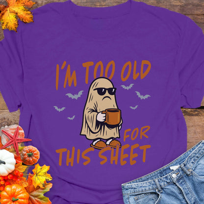 Purple t-shirt with ghost graphic and text 'I'm too old for this sheet'.