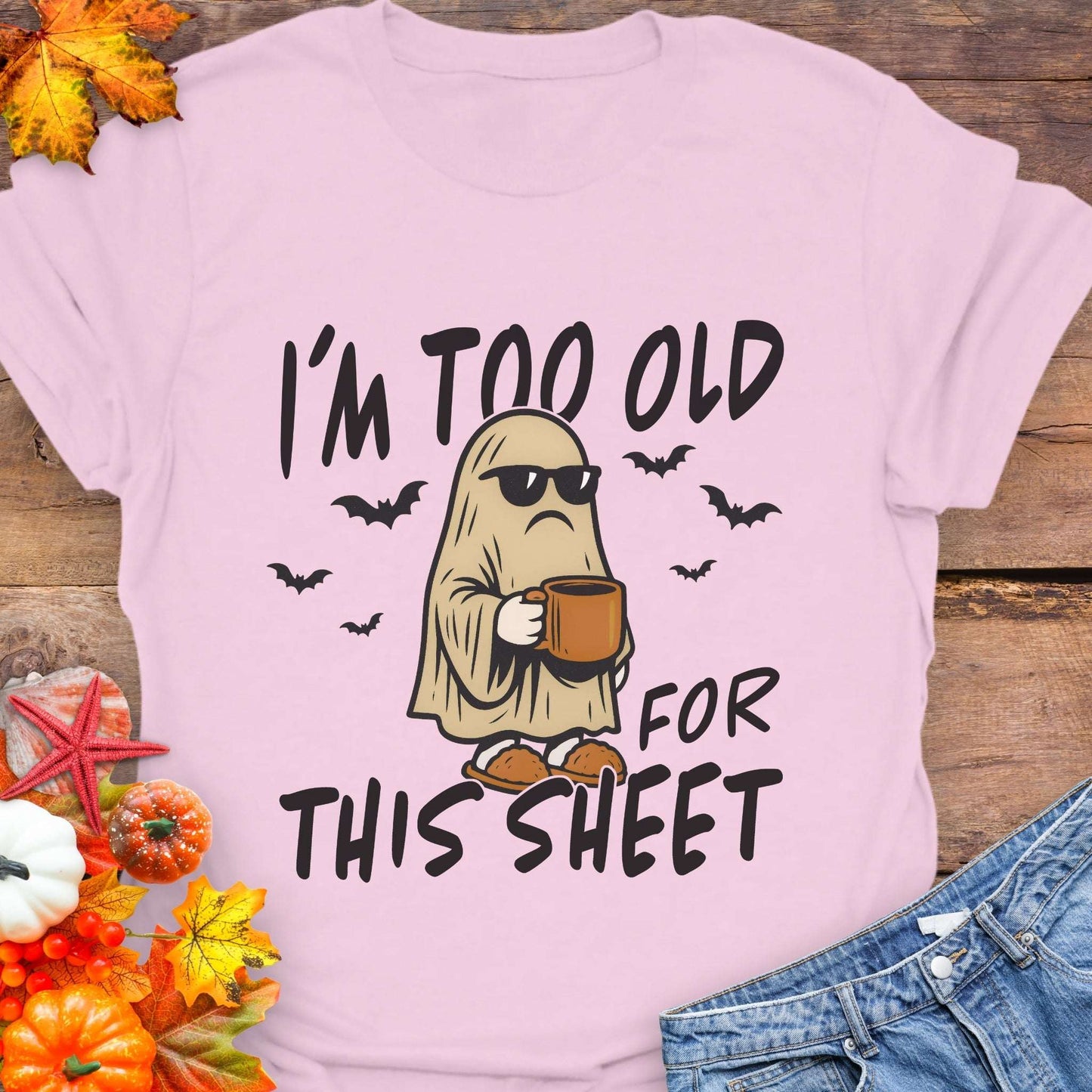 Pink t-shirt with ghost graphic and text 'I'm too old for this sheet'.