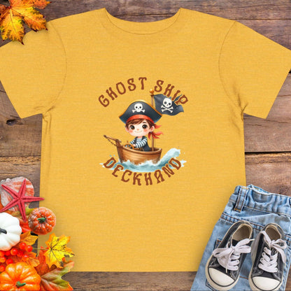 Yellow t-shirt with a cartoon pirate boy in a boat with text 'Ghost Ship Deckhand'. 